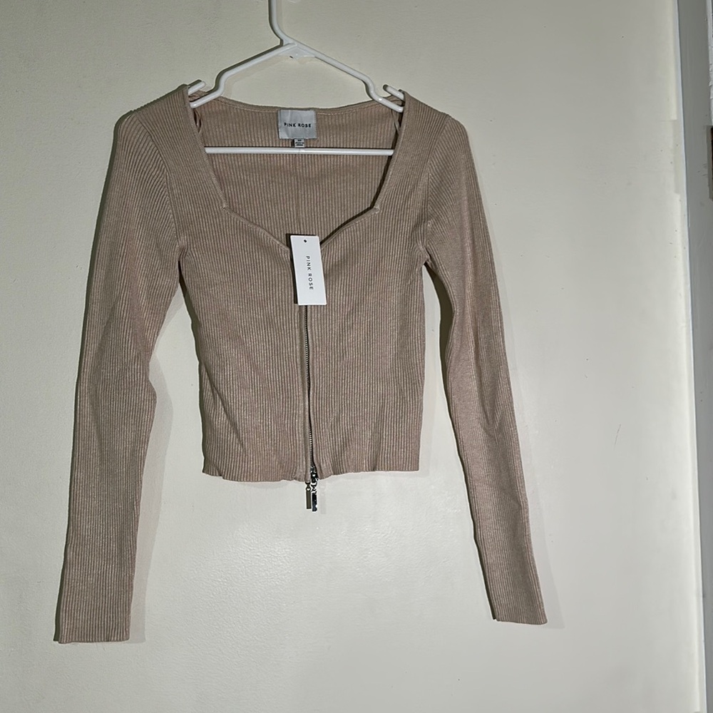 New with tags! Pink rose brand oatmeal color zip up. Size XS.
